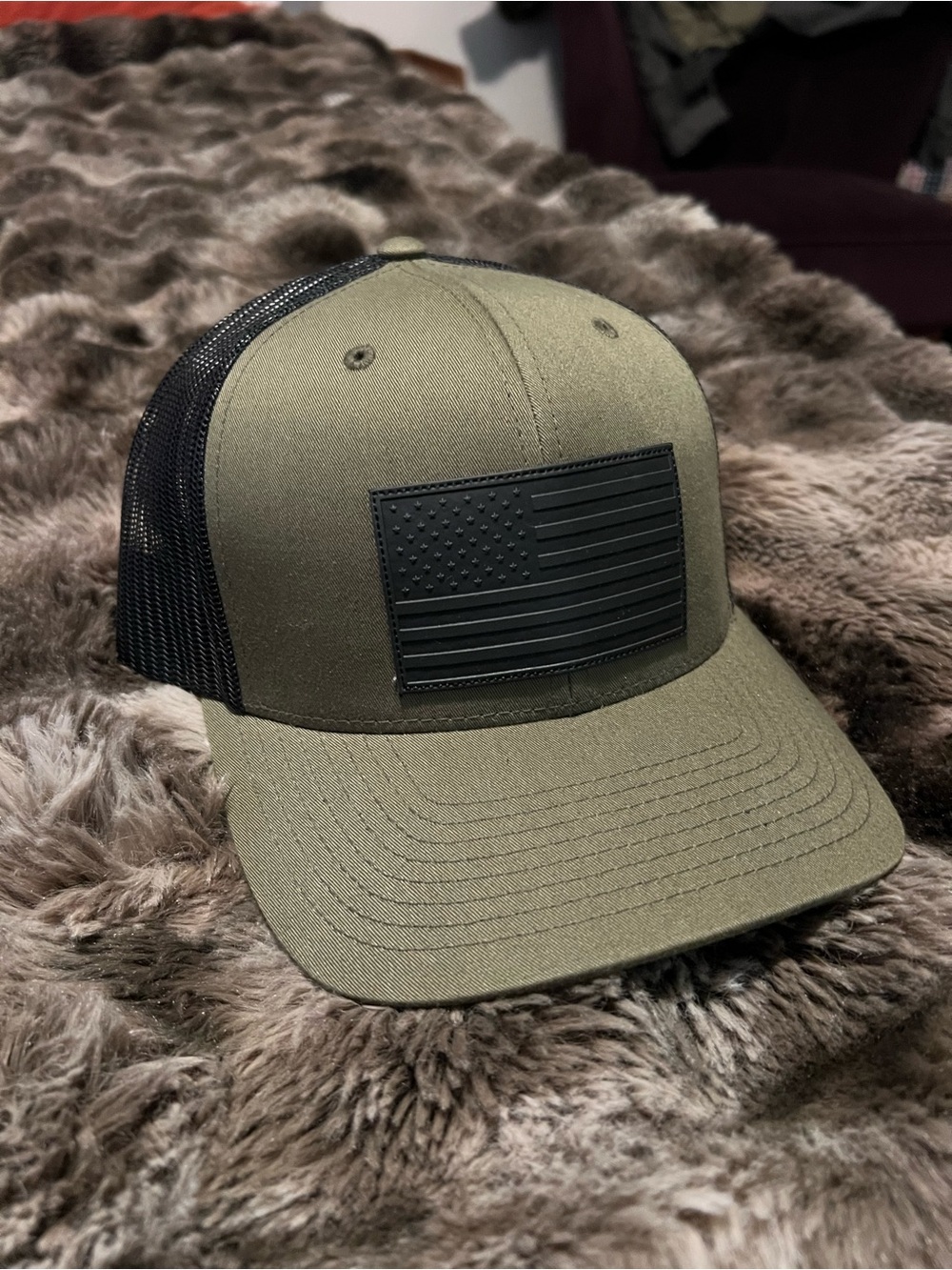 Olive Green Mesh Back Trucker Hat with Black Flag Patch